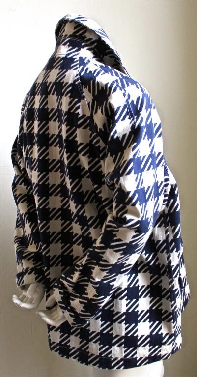 Navy and white checked canvas jacket designed by Azzedine Alaia for his ''Tati' inspired collection, spring of 1991. Labeded a French size 36. Unlined. Made in France. Very good condition (slight fading).