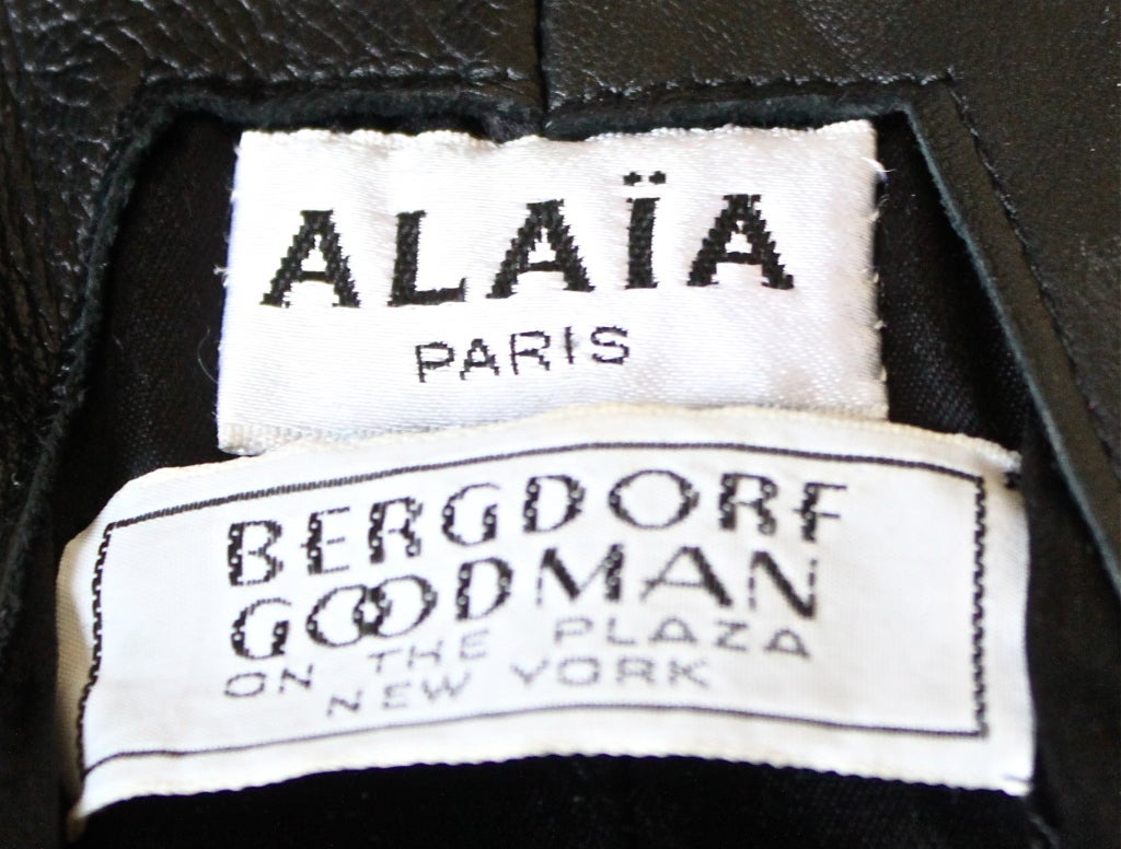 Women's AZZEDINE ALAIA black leather jacket with full skirt