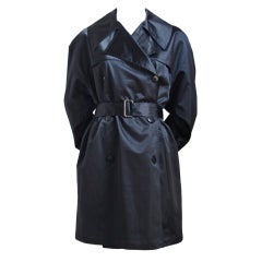 AZZEDINE ALAIA black sateen trench coat with belt