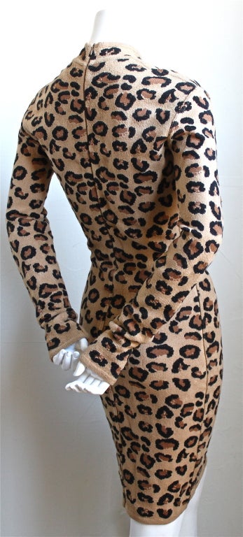 Very rare leopard knit dress with v-neckine from Azzedinr Alaia dating to the Autumn/Winter collection of 1991-1992. labeled a Size 'M'. Zips up back with invisible zipper. Made in Italy. Excellent condition.
