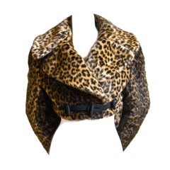 AZZEDINE ALAIA faux leopard fur jacket with frog closure