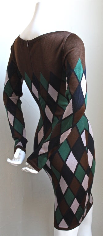 Very rare harlequin knit dress dedigned by Azzedine Alaia dating to the Autumn/Winter collection of 1993. Labeled a size M, however this will also fit a size S. Zips up center back with a hidden zipper. Made in Italy. Excellent condition.