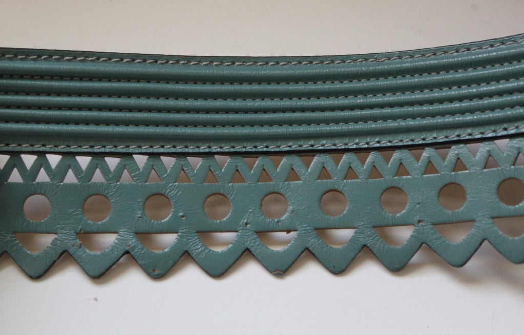 Teal scalloped leather laser cut belt from Azzedine Alaia dating to spring/summer of 1992. Size 75. Made in France. Very good condition. I also have this belt available in black.