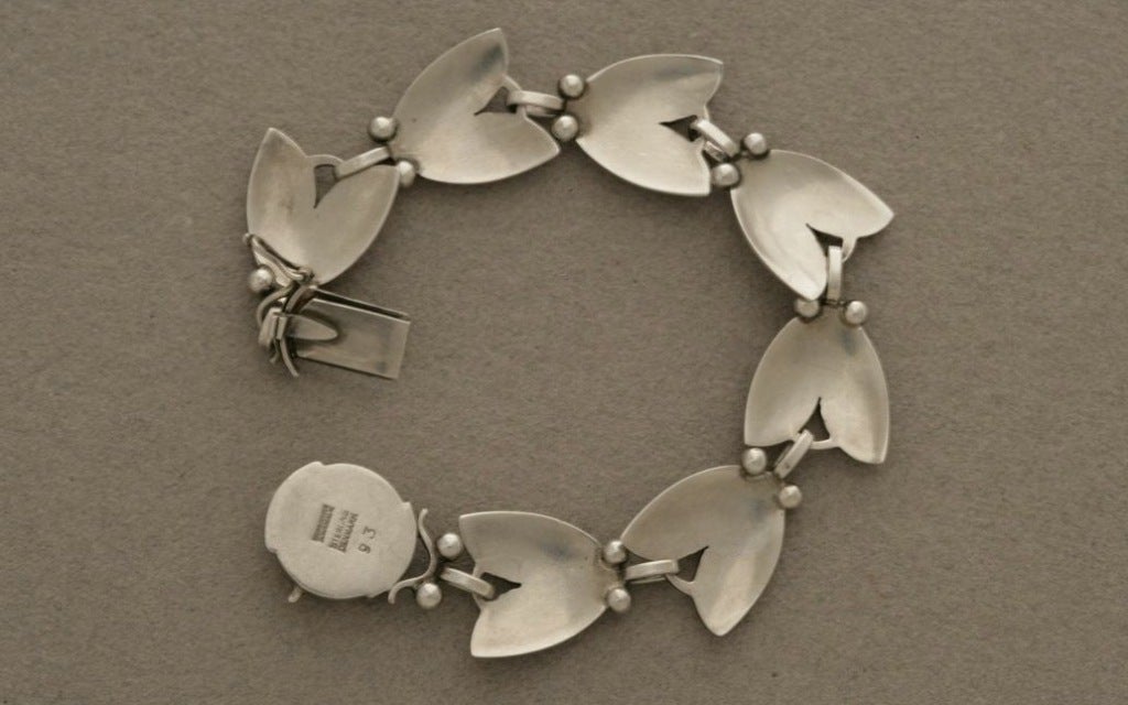 Georg Jensen art deco bracelet no. 93 designed by Harald Nielsen. 
Matching necklace available. Excellent vintage condition. Early marks for this design. Sterling silver.

Harald Nielsen (1892 - 1977) is an important figure in the history of the
