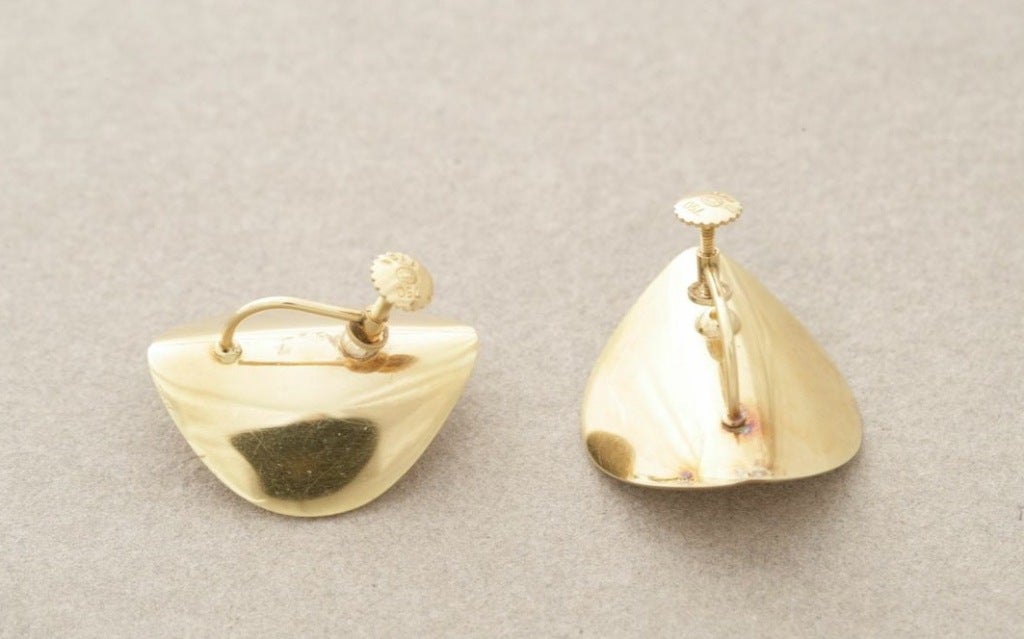 Georg Jensen modernist earrings by Nanna Ditzel in 18kt gold, screwbacks...can be converted at no charge.

Nanna Ditzel (1923 - 2005) was one of Denmark’s most accomplished contemporary designers and the first woman to design for the Georg Jensen