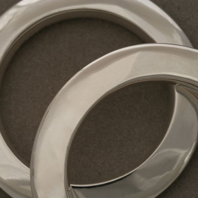 Ralph Lauren Sterling Silver Pair of Bangles 

Gorgeous, modern design. Excellent condition. Measures 2.5