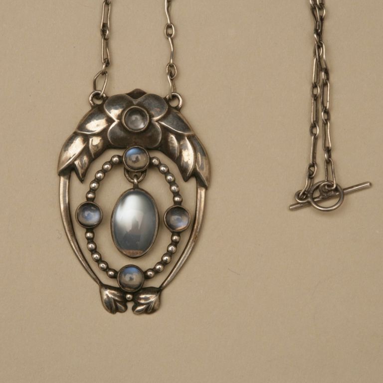 Georg Jensen Early Moonstone Pendant  No 8,  

 830 Silver

Exceptional quality and detail. Toggle clasp . 20 