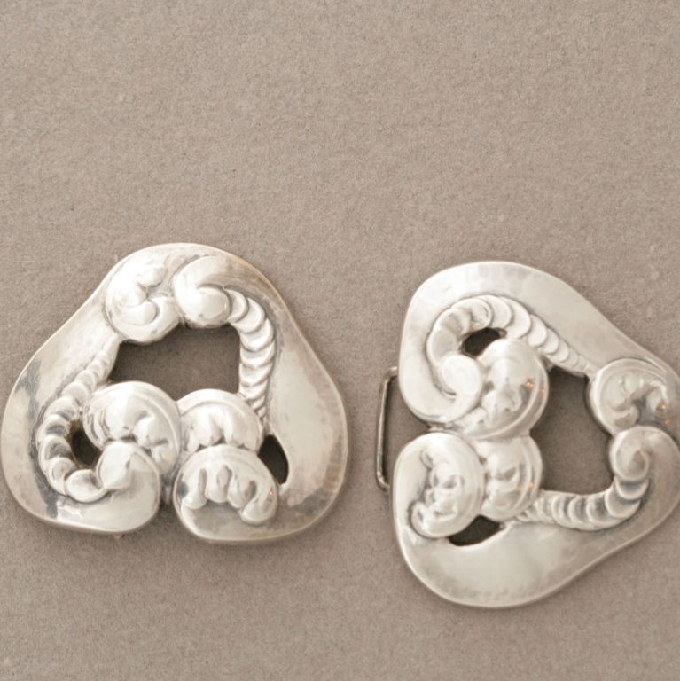 Extremely rare, hand-made belt buckle or cape clasp created by Jensen during his earliest design period starting around 1906. Very few were ever produced. This piece was made circa 1920s. 830S.