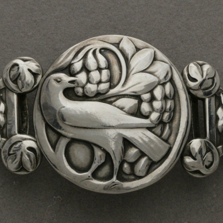 Georg Jensen Exceptionally Rare Belt Buckle from his "First" Period. 826 silver content was used during this period.

Large scale and heavy at 6" long. Entirely handmade, beautifully 
hand-hammered details and chasing. 

Fully
