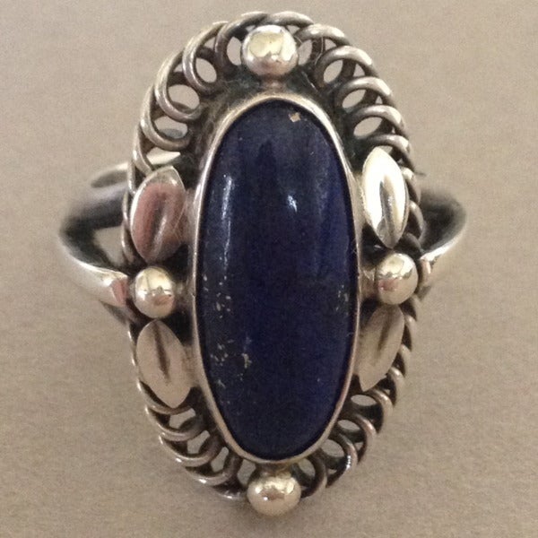 Classic Jensen design with a beautiful lapis lazuli stone. Sterling silver, excellent condition. Circa 1930s, Denmark. Size 6.