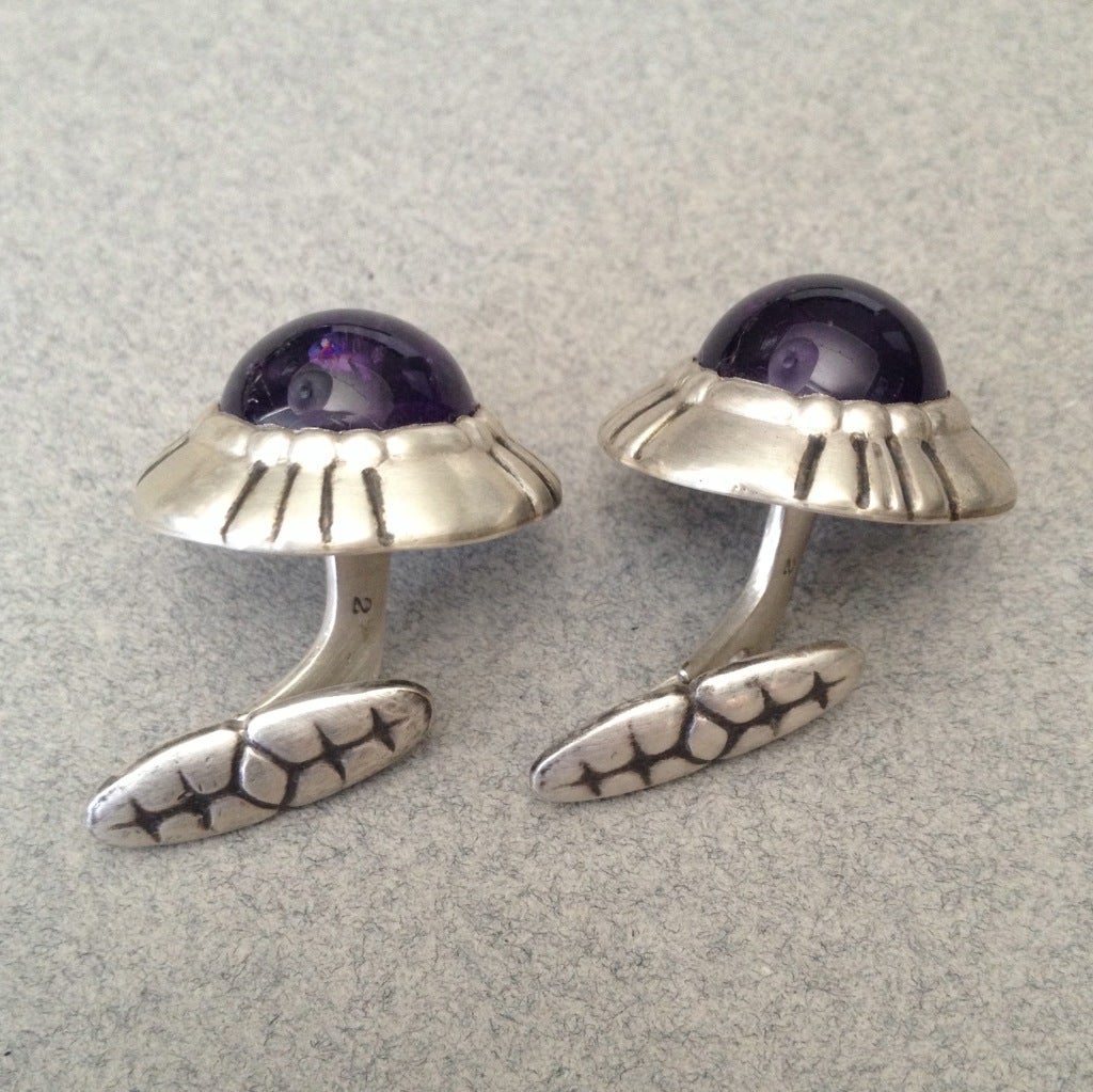 Oversized cufflinks with beautiful amethyst stones.