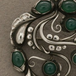 Rare Georg Jensen brooch no. 159 with green agate. Excellent vintage condition. Designed by Georg Jensen.