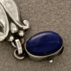Georg Jensen Sterling Silver  Bracelet no. 11 with Lapis Lazuli. Excellent condition.

A similar example can be found on p. 116 in the book, 