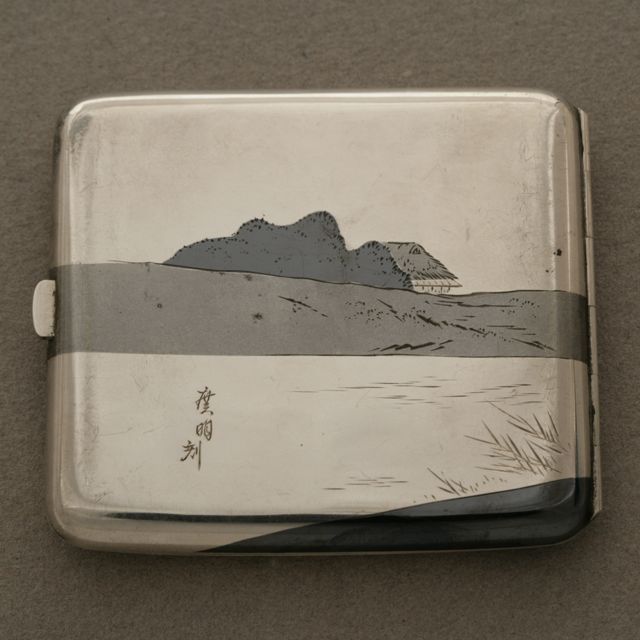 Japanese mixed metal cigarette case, ( can be used for business cards or credit cards) Retailed by K. Uyeda renowned jeweler from the Imperial Hotel in Tokyo Japan. Silver, copper and brass.