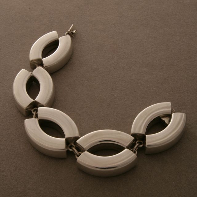Georg Jensen Bracelet no. 218 by Astrid Fog. Designed in 1971.
Very Rare design. Comes with original Georg Jensen box.