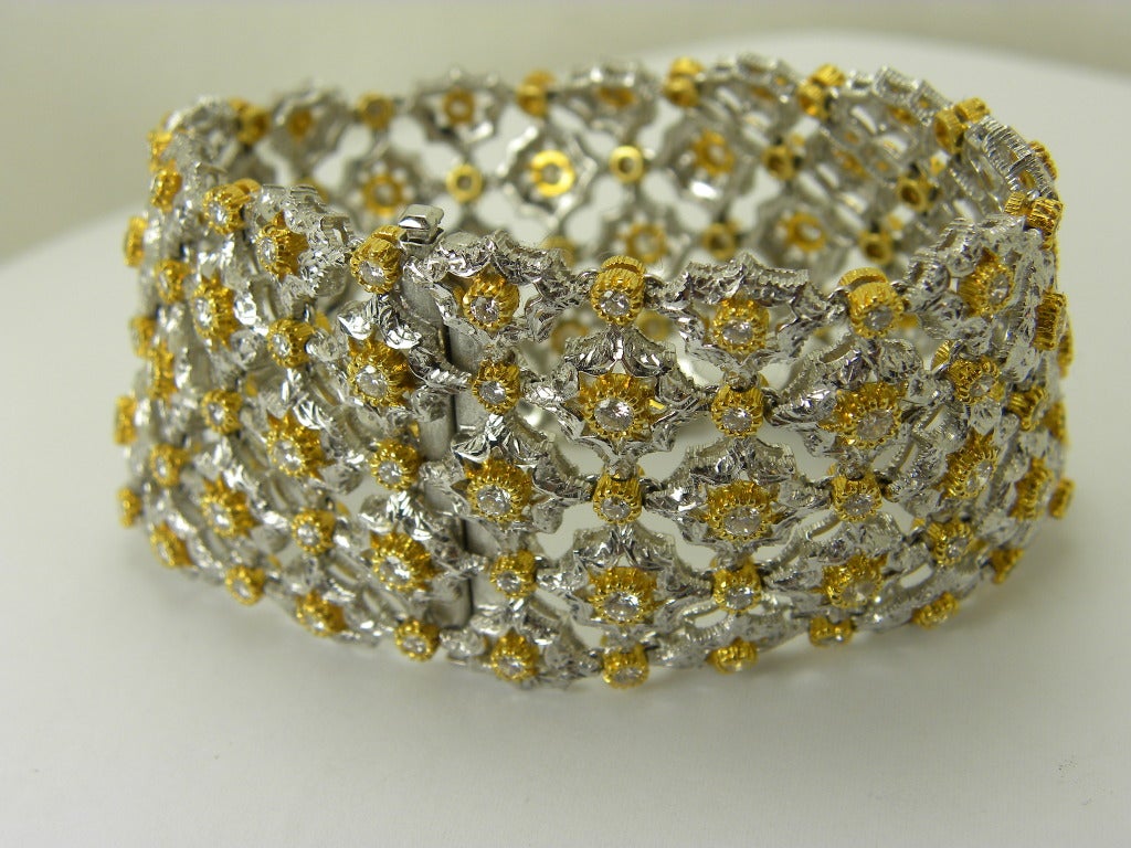 White and yellow gold engraved mesh design diamond bracelet