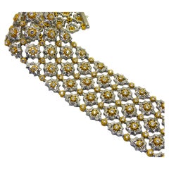White and yellow gold engraved mesh design diamond bracelet