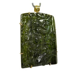 important carved green tourmaline pendant