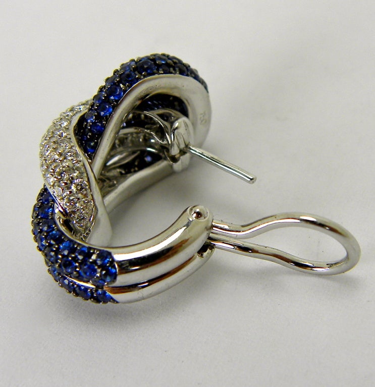French knot design diamond and sapphire earrings.