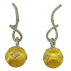 Diamond swirl earring with removable gold and diamond bottoms