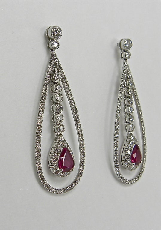 Women's drop Ruby and Diamond earrings For Sale