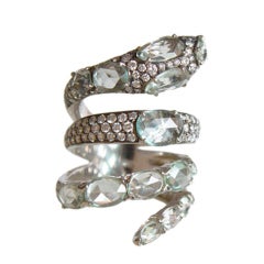 Stunning Diamond and Green Sapphire Snake Wrap Ring