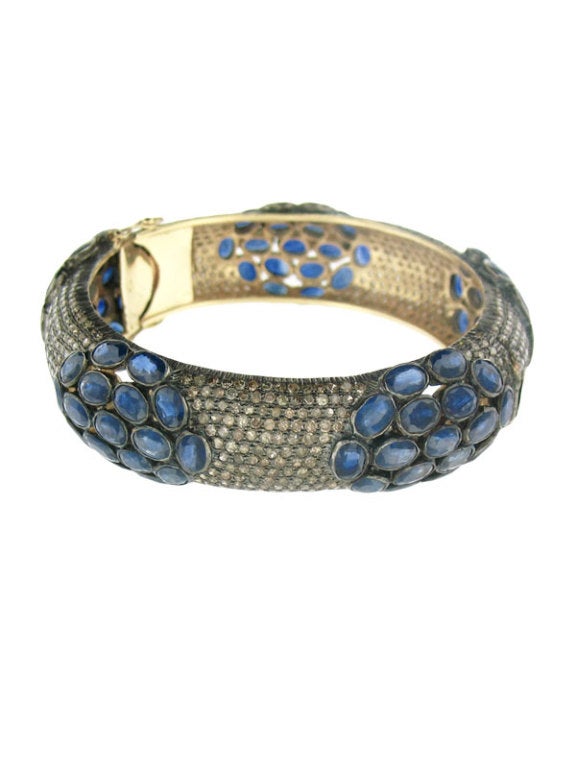 14K Yellow Gold and Oxidized Silver Pave Diamond Encrusted Bracelet with Sapphire Cabochon Accents.
Great to wear alone or stack together!