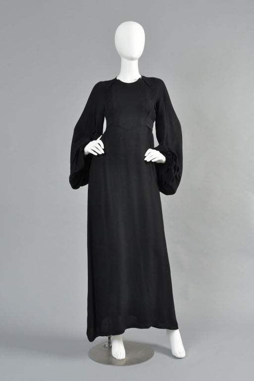 Lovely circa 1969 Ossie Clark evening gown. Truly a beautiful, understated piece!  This dress features high buttoning neckline with a nearly-empire waist and attached half-sash. Of course its crowning glory is the ridiculously draped (so classically