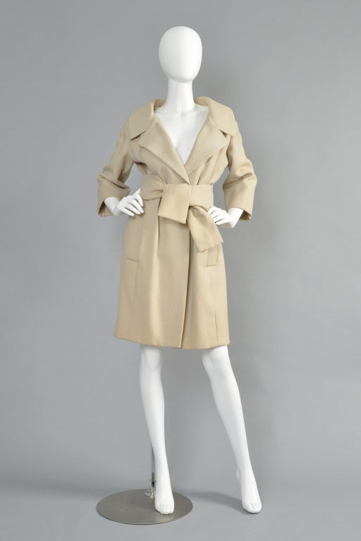 Exquisite 1959 Yves Saint Laurent for Christian Dior spring/summer 1959 haute couture jacket. A truly rare gem!

This lovely spring jacket features all of the haute couture details that make collectors' mouths water! The body of the coat has a