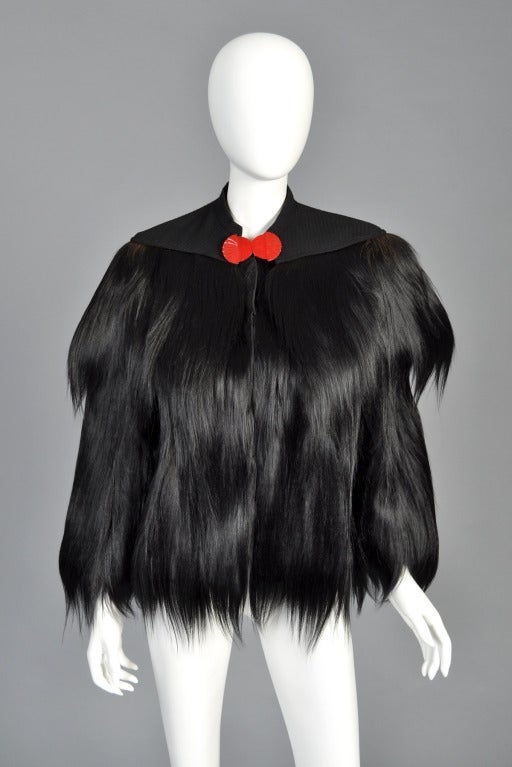 Just reduced from $3200 to $1400

By far one of the rarest and most beautiful furs we've had the pleasure of finding!  Deadstock 1930s gold coast monkey fur - unworn with original tags. Short bolero-style coat with wide-cut sleeves + cordé