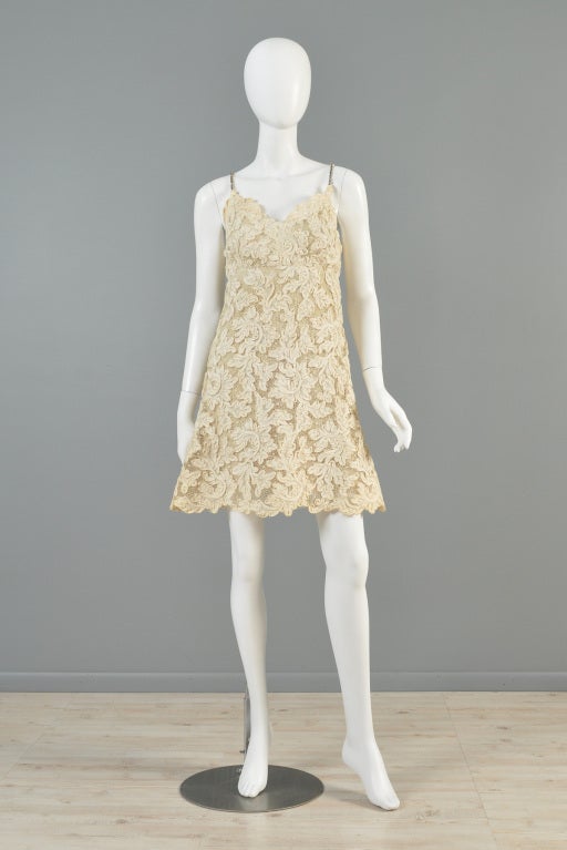 Stunning early Bill Blass for Maurice Rentner vintage 1960s lace cocktail dress. Absolutely stunning piece + ultra rare find. Entirely made from stunning hand-made tape lace. High empire waist with flared hips. Classic 1960s silhouette. Amazing