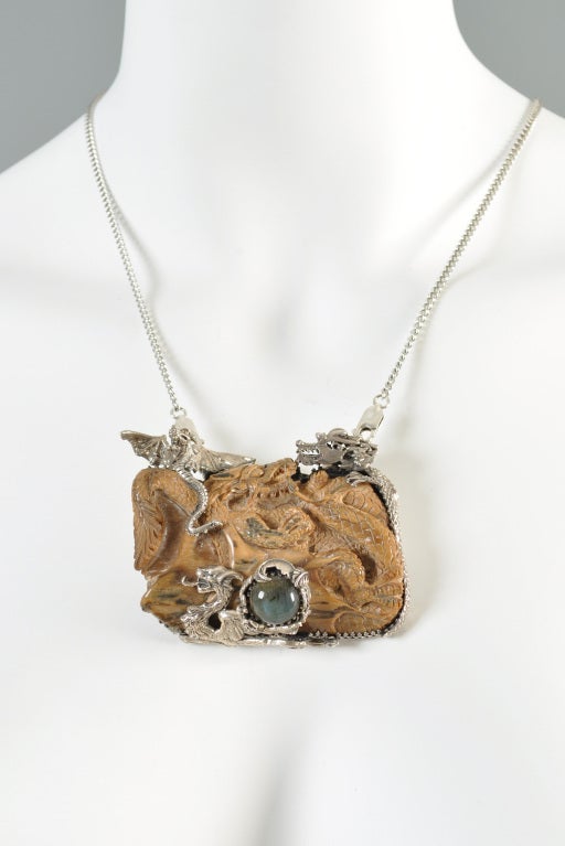 Incredible Bob Stringer one of a kind, hand carved sterling silver + bone ivory pendant. Absolutely AMAZING find. Extremely rare artisan piece! Double sided and works as 2 necklaces in 1! Insane swirling dragon is entirely hand carved from bone. Set