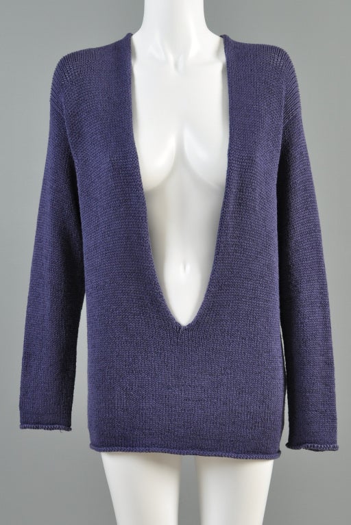 Superb Pacific blue Hermes plunging front knit sweater. Slightly draped fit with long sleeves + neckline that plunges just below the waist. Ultra soft silk knit.

MEASUREMENTS
Bust: 40-42