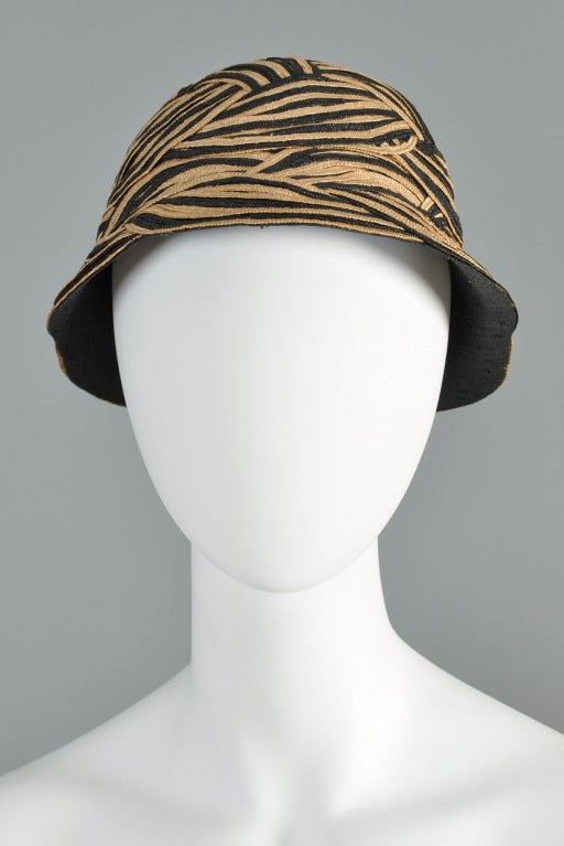 Elsa Schiaparelli cloche style woven raffia/straw hat. Incredible graphic pattern. Perfect spring or summer piece!