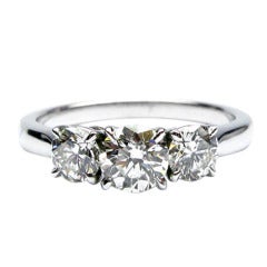 1.21 carats H SI1 Round Brilliant Diamond 3-Stone Ring 2