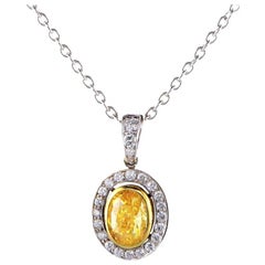 Pendentif avec cadre en diamant jaune vif fantaisie de 0,74 carat VS1