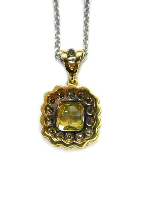 Contemporary 1.68 carats Fancy Vivid Yellow VVS2 Radiant Diamond Pendant For Sale
