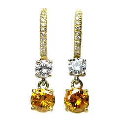 Fancy Vivid Yellow Orange Diamond Earrings