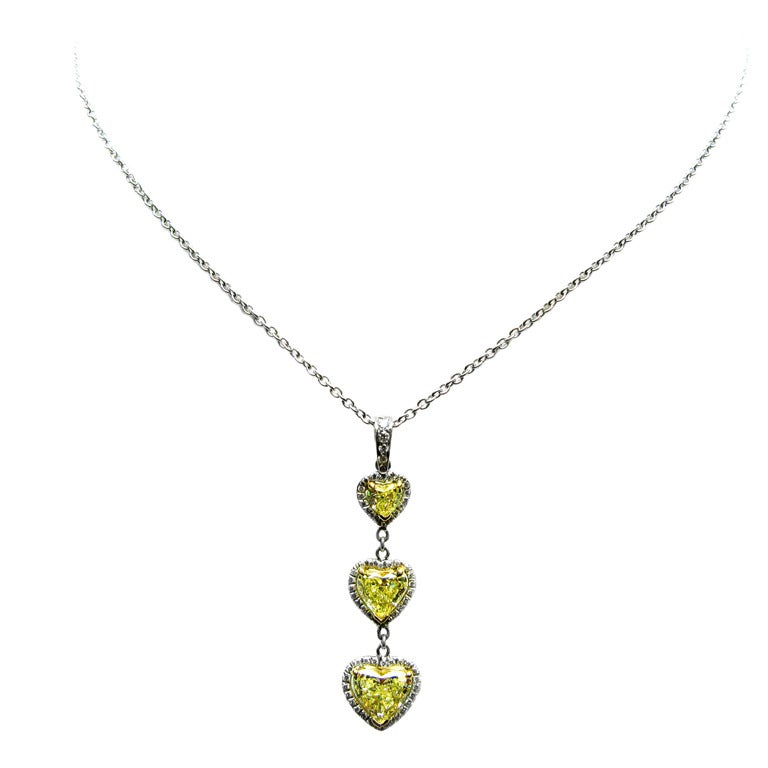 Fancy Yellow Diamond Triple Heart Pendant For Sale