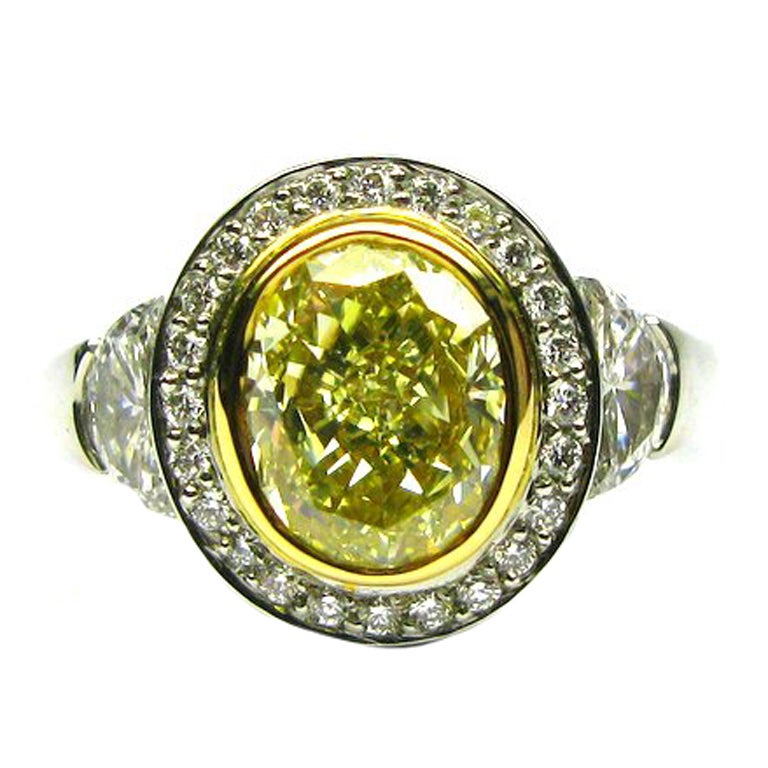 2.07ct GIA Fancy Yellow SI1 Oval Diamond Frame Ring