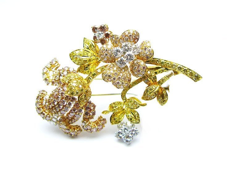 Spectacular Floral diamond brooch perfect for wearing on dark color jackets and dresses for maximum impact.