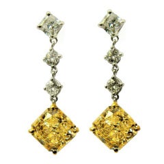 6.29 carats Fancy Yellow SI1 Radiant and Cushion Diamond Drop Earrings
