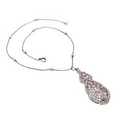 Circa 1910s  Platinum Filigree Diamond Pearl Pendant Necklace
