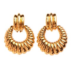 Boucles d'oreilles cerclées en or en forme de bouton de porte