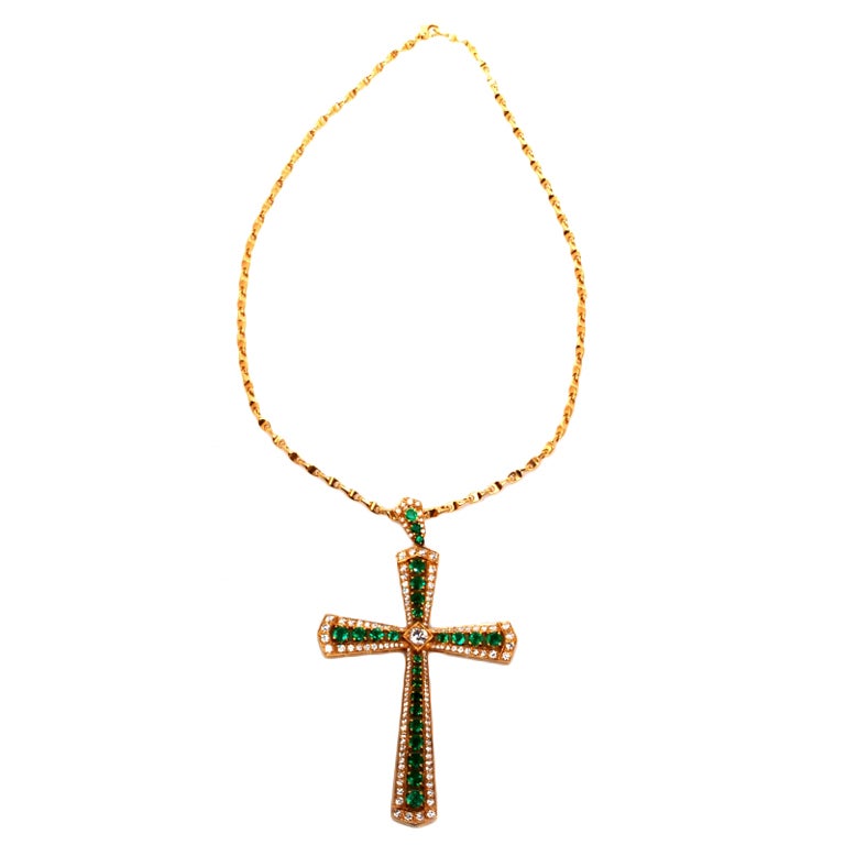 This magnificent Vintage retro cross pendant necklace is crafted in solid 18K yellow gold. The pendant is accented with some 142 genuine round cut diamonds, all approx 5.00cttw, H - I color, VS clarity plus  centered with 1 genuine round brilliant