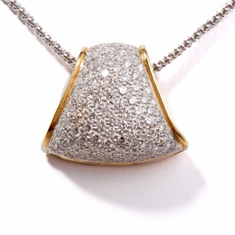 This gorgeous estate slide pendant necklace is crafted in solid 18K white and yellow gold. This piece displays a beaded like chain and a slide pendant that is accented with 90 genuine round cut diamonds approx 6.70ttw, G-H color, VS clarity, all