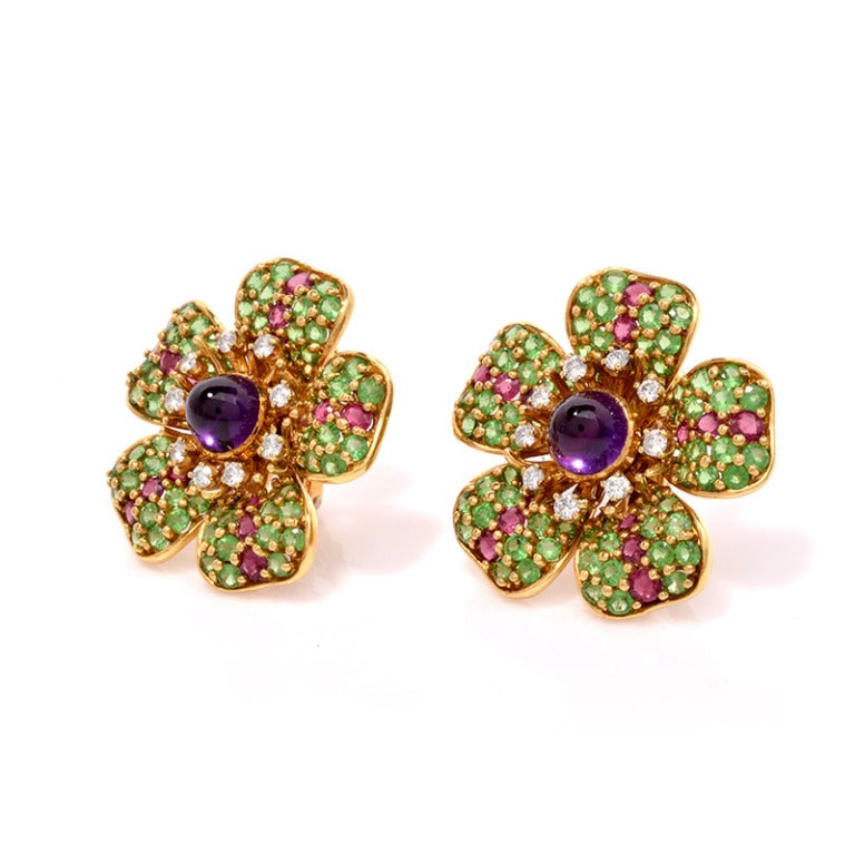 Exceptionally eye-catching with sparkle and color, these exquisite Tiffany & Co. floral earrings are made of the finest materials and quality workmanship circA 1990'S They are combined with the timeless style and glamour of Tiffany. Finely crafted