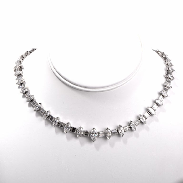 This elegant and beautiful diamond necklace gleams from every angle with stunning brilliance and sparkle. Finely crafted in solid platinum, this necklace is set with a graduated alternating diamond necklace design that makes it special and