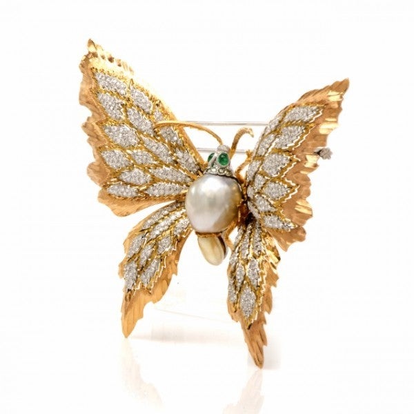 This Buccellati Retro inspired butterfly lapel brooch is crafted in a combination of solid 18K pink and white gold, weighs approx. 40.9 grams and measures approx. 3