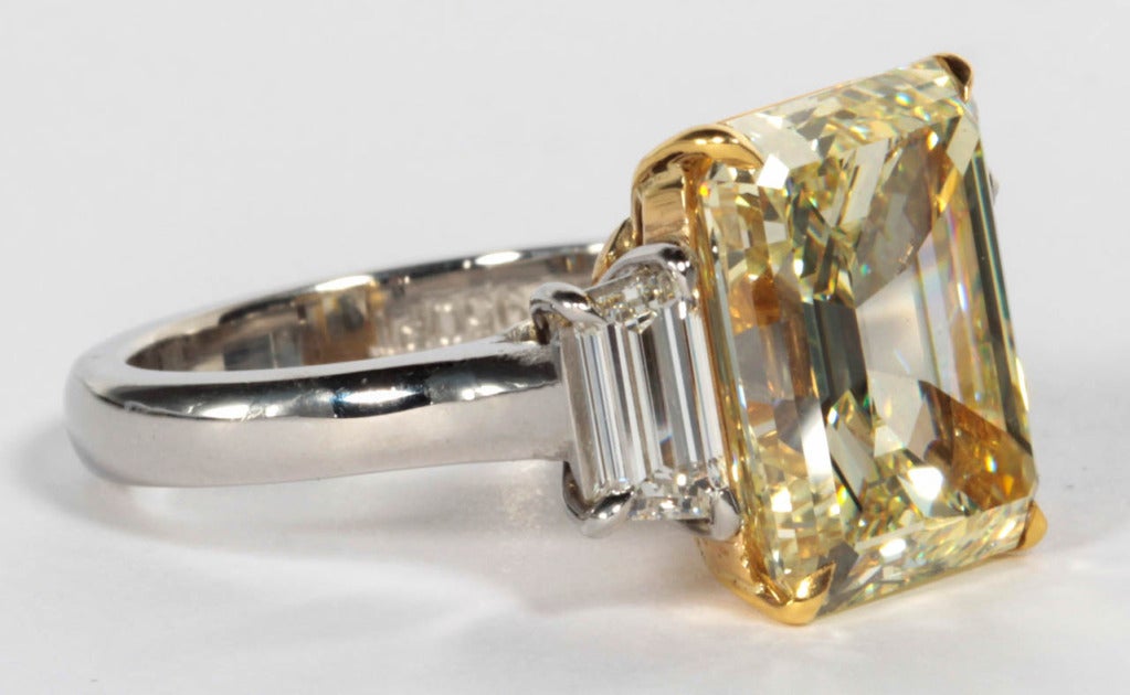 Rare 7.86 Carat GIA Certified Emerald Cut Light Yellow Diamond Platinum Ring In Excellent Condition In New York, NY